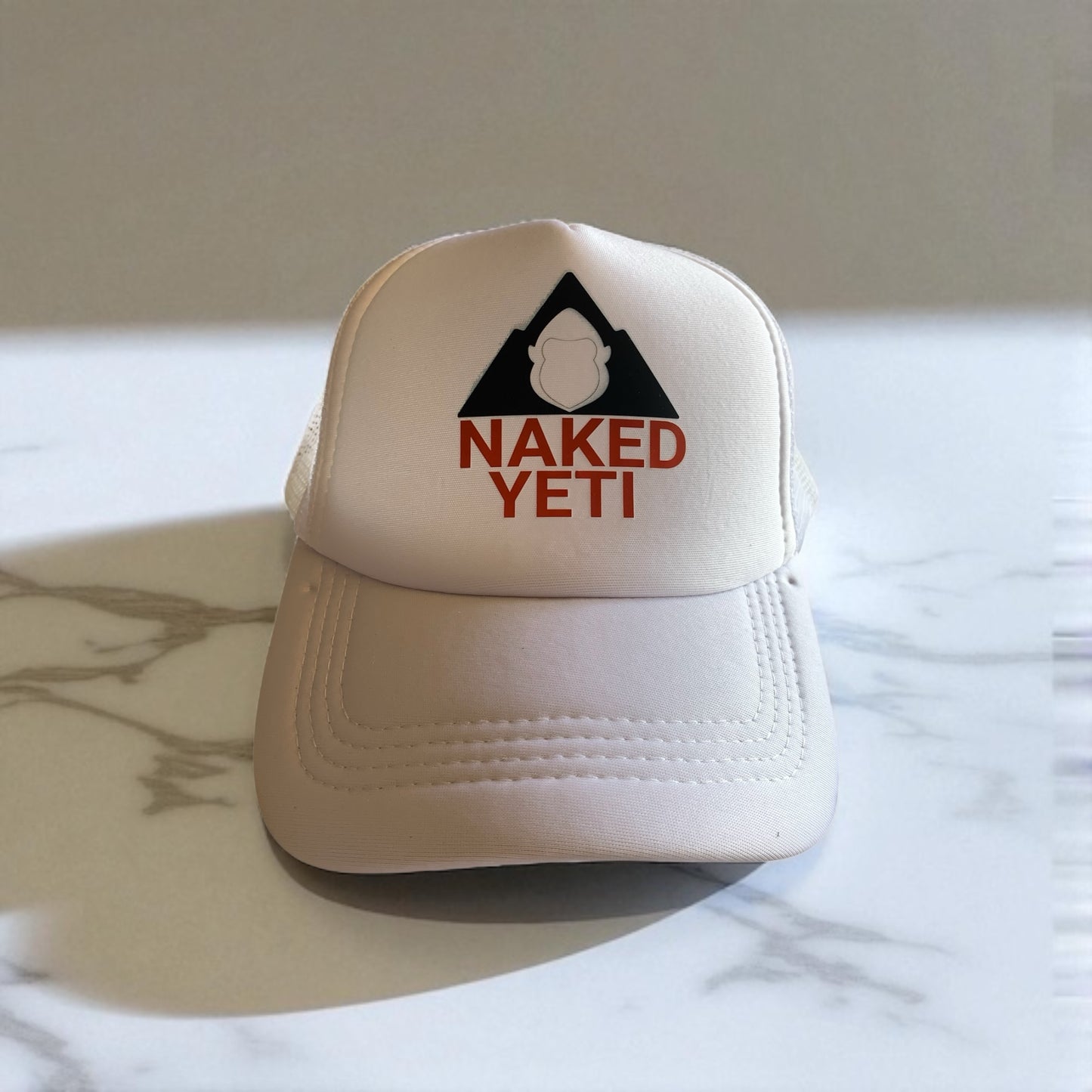 Naked Yeti Men’s “Arctic Blaze” trucker hat